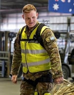RAAF leader honored for advancing injury prevention by scaling Apex 2 exosuits across Combat Support Group