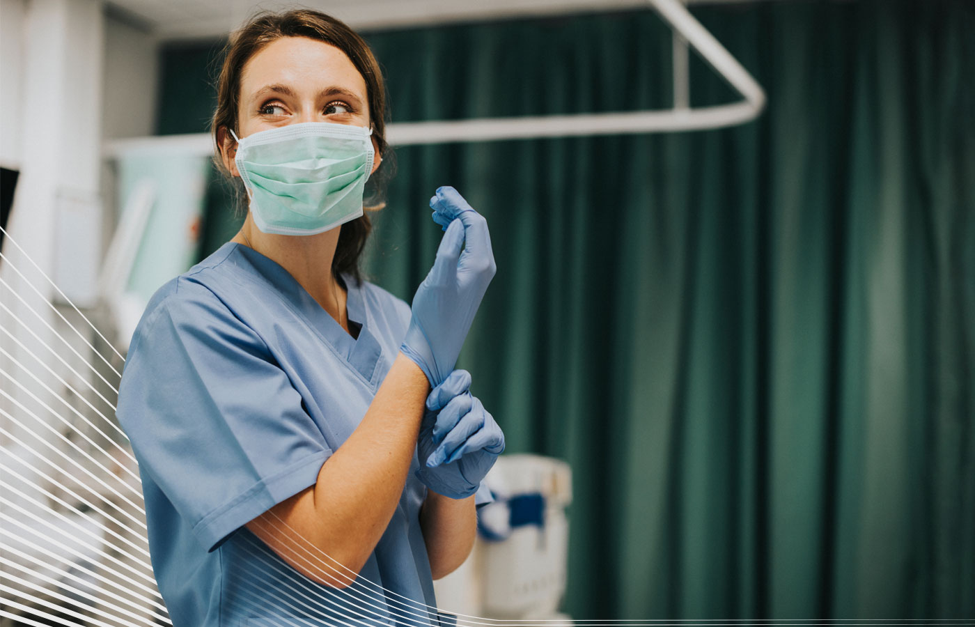 Woman nurse wearing masks wearing blue elastic gloves. 